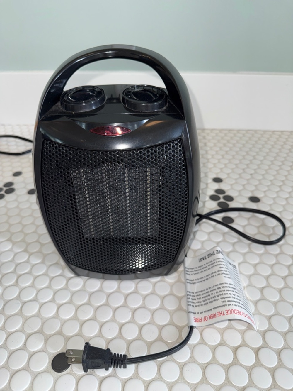 Compact Black Portable Electric Space Heater with Handle
NIB